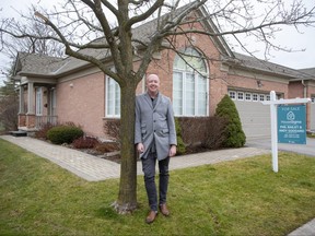 Realtor Phil Bailey, in front of  2025 Meadowgate Blvd. in London on Monday, Dec. 12, 2022, says home buyers can get more house for less money in the London area, because interest rate hikes have moderated demand.  (Derek Ruttan/The London Free Press)
