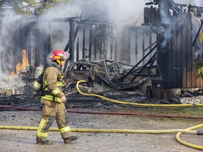 All the residents were able to escape safely, but a home and two vehicles at 4646 Calvert Dr. in Glencoe were destroyed by fire on Tuesday, Dec. 13, 2022. (Derek Ruttan/The London Free Press)