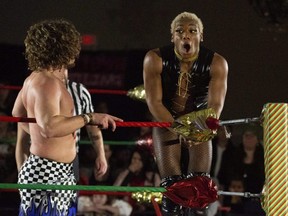 Sonny Kiss lands awkwardly on the ropes during a Greektown Wrestling championship title bout against reigning champion Channing Decker at the Marconi Club in London on Sunday December 18, 2022. It was the fourth time the Toronto-based independent wrestling circuit has come to London. (Derek Ruttan/The London Free Press)