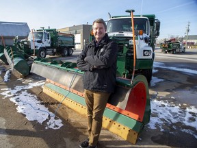 The City of London's division manager of road operations John Parsons leans against a sander/salter with a front plow on Wednesday as the city gets ready to deal with a major winter storm heading London's way. (Derek Ruttan/The London Free Press)