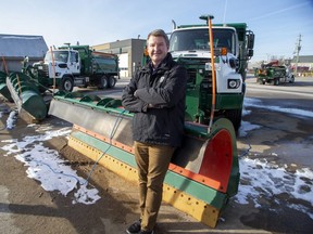 John Parsons, the City of London's division manager of road operations, leans against a sander/salter with a front plow on Wednesday, Dec. 21, 2022, as the city gets ready for a major winter storm expected to begin Thursday. (Derek Ruttan/The London Free Press)