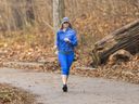 Julie Roberts cruises through her six-kilometre run in Springbank Park early on Wednesday, Dec. 7, 2022. Roberts says she gets out four or five times a week if possible.  Mike Hensen/The London Free Press