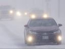 Drivers on Wonderland Road near Southdale Road contend with drifting snow on Friday Dec. 23, 2022. (Mike Hensen/The London Free Press) 