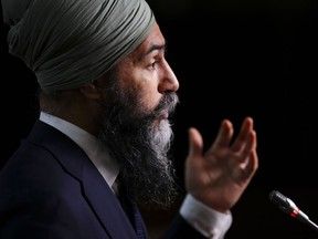 NDP leader Jagmeet Singh speaks to reporters on Parliament Hill in Ottawa on Wednesday, Dec. 7, 2022.