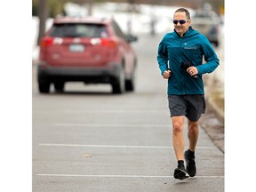Brian Arnold breaks out the shorts as he embarks on a 10-kilometre run through Springbank Park in London on a mild Thursday, Dec. 29, 2022. Arnold says he runs 10 km every other day for fitness. (Mike Hensen/The London Free Press)