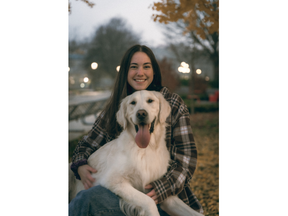 Alyssa Harvey, 25, said she is considering launching a formal complaint after facing pushback from hospital staff at a London emergency room for bringing her service dog Bailey. Harvey has had the trained golden retriever for three years to help her manage a mental health condition. (Contributed/Alyssa Harvey)