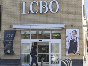 Patrons exit an LCBO store at Coxwell Ave. and O'Connor Dr. in Toronto.