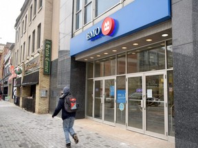 London police responded around 1 p.m. Friday to a robbery at the Bank of Montreal branch on Dundas Street at Wellington Street. (Calvi Leon/The London Free Press)