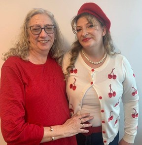 Judy Baker hugs her daughter Brittany who thanks in part to the combined services of CMHA Thames Valley Addiction and Mental Health Services, is sober, social and back creating art. (RANDY RICHMOND/The London Free Press)