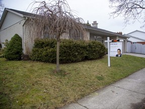 This house for sale at 439 Village Green Ave. in London on Thursday Jan. 5, 2022 is one of many of the market, but there were few buyers in December, according to local real estate market data. (Derek Ruttan/The London Free Press)
