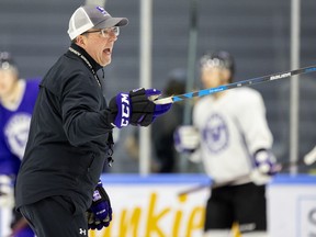 Clarke Singer, the Western Mustangs men’s hockey head coach, leads a practice  on Wednesday January 25, 2023. Mike Hensen/The London Free Press