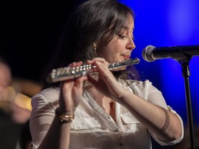 Flutist Katie Kirkpatrick solos during the Western University Jazz Ensemble's performance of Out of the Night by Sammy Nestico during their concert at the Wolf Performance Hall in London on Thursday Jan. 26, 2023. Mike Hensen/The London Free Press