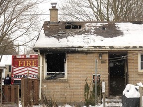 London fire department officials remained at 238 Tremont Rd. in east London on the morning of Monday Jan. 30, 2023. About 12 hours prior, a blaze broke out that killed Merle Ellis, 81, and did significant damage to the house. (Mike Hensen/The London Free Press)