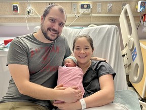 Baby Evelyn Stewart, shown with parents Jennifer and Michael, was the first-born baby in London in 2023. (London Health Sciences Centre photo)