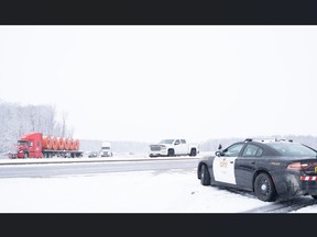 Traffic was being rerouted on Sunday Jan. 22, 2023 from Highway 401 at Veterans Memorial Parkway in London following a crash involving a tractor trailed that spilled fuel and forced the closing of the westbound lanes. JONATHAN JUHA/The London Free Press