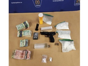 Two Londoners are facing a string of drug and weapons charges after a drug bust turned up a loaded handgun, opioid pills and cocaine. (London police/Supplied)