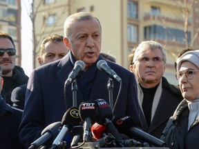 Turkish President Recep Tayyip Erdogan talks to the press during his visit to the hard-hit southeastern Turkish city of Diyarbakir, five days after a 7.8 magnitude earthquake struck the border region of Turkey and Syria, on February 11, 2023. - The disaster and resulting fury at how the Turkish government has handled it, comes just months before a presidential election in June. Erdogan conceded for the first time on February 10, 2023 that his government was not able to reach and help the victims "as quickly as we had desired". (Photo by ILYAS AKENGIN/AFP via Getty Images)