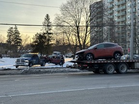 London police closed a portion of Adelaide Street, between Windermere Road and Huron Street, following a Sunday night crash. Two heavily damaged vehicles remained at the scene early Monday, Feb. 27, 2023. (Jonathan Juha/The London Free Press)