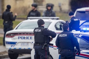 Police are on the scene of a suspected shooting in London on March 30, 2022. The increase in gun violence has prompted police chiefs to seek an urgent meeting with Canadian premiers.  (Derek Ruttan/The London Free Press)