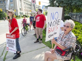 Tenants rights advocates, including Pauline Salisbury, protest outside of London city hall as city councillors debate whether to move ahead with a rental housing inspection system on Tuesday, July 5, 2022. (Derek Ruttan/The London Free Press)