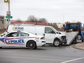 Four adults were taken to hospital with minor injuries following a crash involving this van and another vehicle at the intersection of Veterans Memorial Parkway and Admiral Drive in London on Friday, Feb. 10, 2023. (Derek Ruttan/The London Free Press)