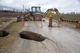 Fernhill Drive in Middlesex Centre was closed between Poplar Hill Road and Wood Road due to a sinkhole. Photo shot on Friday February 10, 2023. (Derek Ruttan/The London Free Press)