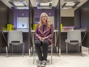 Sonja Burke is director of harm reduction services with the Regional HIV/AIDS Connection. She is seated at the so-called consumption stations in the new supervised drug-use site at 446 York St. in London on Wednesday February 22, 2023. (Derek Ruttan/The London Free Press)