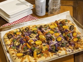 This vegetable pizza with smoked mozzarella, inspired by Jill Wilcox's "love at first bite" visit to a Florence restaurant, is a delicious departure from traditional homemade pizza.  (Mike Hensen/The London Free Press)