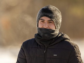 Johan Suarez, 19, cools down after an hour-long run in Springbank Park in London on Tuesday, Jan. 31, 2023. Suarez, a newcomer to London from Colombia, said the weather was "perfect." (Mike Hensen/The London Free Press)