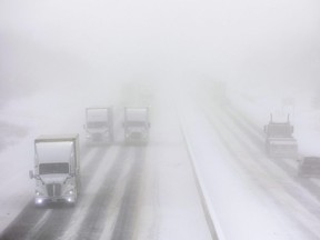 Visibility was severely limited on Highway 401 near the interchange with Highway 402 in London during a snow squall on Friday, Feb. 3, 2023. (Mike Hensen/The London Free Press)