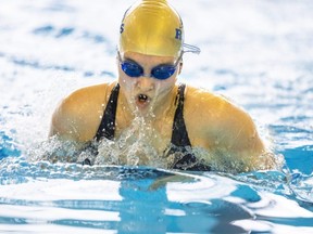 Lydia Drummelsmith of the Laurier Rams swims in the girls 14 and older 50-metre breaststroke at the WOSSAA championship meet at the Canada Games Aquatic Centre in London on Wednesday, Feb. 15, 2023.  (Mike Hensen/The London Free Press)