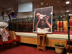 A picture of Tyre Nichols is seen during a news conference held by relatives of Nichols, the Black man who was beaten by Memphis police officers during a traffic stop and died three days later, at Mason Temple: Church of God in Christ World Headquarters in Memphis, Tenn., Tuesday. (Alyssa Pointer/Reuters)