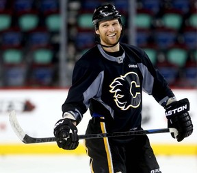 Calgary Flames Dennis Wideman practises with his team at the Scotiabank Saddledome as the Flames head into the last week of regulation in Calgary, Alta., on Monday, April 6, 2015.  (Darren Makowichuk/Postmedia Network)