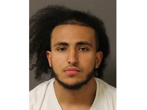 London police have an arrest warrant for Zainaldeen Sakr, 18, on charges stemming from a shooting on Friday at a northwest London parking lot that injured one man. (Police photo)