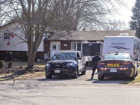 A heavy police presence remained on Mechanic Street in Waterford on Tuesday Feb. 14, 2023, as police investigated the death of 90-year-old Marlene Wilson. (Postmedia)