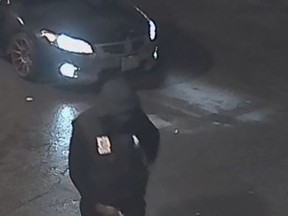 Stratford police are searching for a suspect, seen in a screen grab from surveillance video, who assaulted the owner of a Stratford variety store in the store's parking lot. (Stratford police handout photo)