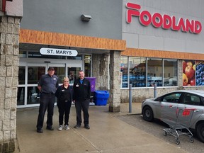 St. Marys Foodland cashier Wanda Mossey recently helped prevent an 89-year-old customer from falling victim to a scam involving the purchase of gift cards. From left are Foodland manager Glenn Dailey, Mossey and owner Corey McKay. Submitted photo