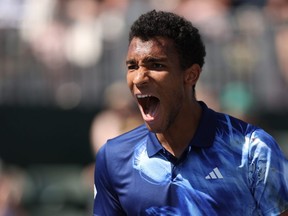 Felix Auger-Aliassime of Canada celebrates defeating Francisco Cerundolo of Argentina during the BNP Paribas Open on March 13, 2023 in Indian Wells, California. (Photo by Julian Finney/Getty Images)