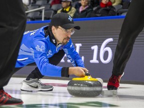 Quebec skip Félix Asselin releases a rock in a 7-6 extra-end win over British Columbia at the Tim Hortons Brier at Budweiser Gardens on Wednesday, March 8, 2023. (Derek Ruttan/The London Free Press)
