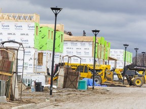Construction continues on the Magnolia Fields subdivision in London on Friday, March 17, 2023. (Derek Ruttan/The London Free Press)