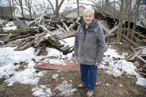 John McLeod says the city wants him to remove the debris from a historic barn on his west London property by hand to avoid damaging a crumbling wall. McLeod was fined $2,000 for demolishing the 19th century barn without a permit in 2020. Photo taken on Wednesday, March 22, 2023. (Derek Ruttan/The London Free Press)