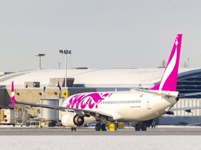 A Swoop jet pulls into a jetway at London International airport on Monday January 20, 2020. (Mike Hensen/The London Free Press)