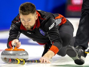 Mike McEwen, the skip for Team Ontario, throws a rock during their practice session to learn the fresh ice for the Brier at Budweiser Gardens in London on Friday, March 3, 2023. 
(Mike Hensen/The London Free Press)