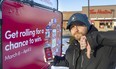 Jeremy McDougall of Tillsonburg shows what he thinks of Tim Hortons on Thursday, March 9, 2023, after the chain denied his prize of $10,000, offering him a $50 gift certificate instead.
McDougall said he was congratulated by Tim Hortons managers for winning $10,000, as his phone showed, before he was told it was a mistake. (Mike Hensen/The London Free Press)