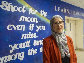 Amira Elghawaby is Canada's special representative on combatting Islamophobia. She was at the London Muslim Mosque on Sunday March 19, 2021. The mural behind her was painted by Yumna Afzaal, 15, who was killed with her parents in an alleged hate-motivated attack in June 2021. (Mike Hensen/The London Free Press)