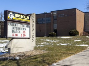 A person was arrested near Montcalm secondary school in London after a student was injured in an assault. Police say they were there to handle a "weapons call." Photograph taken on Thursday March 30, 2023. (Mike Hensen/The London Free Press)