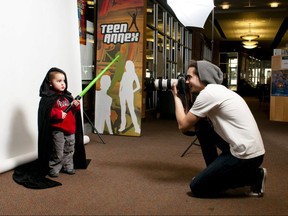Dressed as a Star Wars character, Jack Boisvert, 3, poses for photographer Cory Downing at the Comic Jam photo booth at London Public Library’s Central branch on March 14, 2012. About 500 kids showed up for the March break event sponsored by Heroes Comics. (Derek Ruttan/The London Free Press)