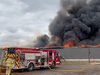 More than 30 London firefighters battled a large barn and grass fire Tuesday afternoon at Old Victoria and Wilton Grove roads. No injuries were reported, the London fire department said. (London fire department photo)