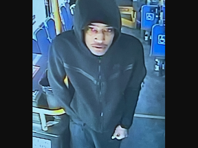 London police released an image of a suspect sought in the stabbing of a driver waiting at a rail crossing on Richmond Street on the afternoon of Tuesday March 21, 2023. (London police handout)