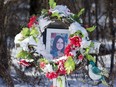 Relatives are appealing for the return of this memorial to Karen Caughlin, 14, taken from the spot where her body was found in 1974 in Lambton County. (Files)
